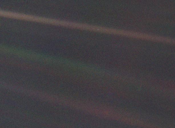 pale blue dot photo of earth by voyager 1