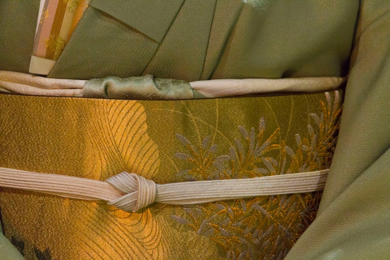 ornate green hostess' kimono worn during traditional Japanese tea ceremony